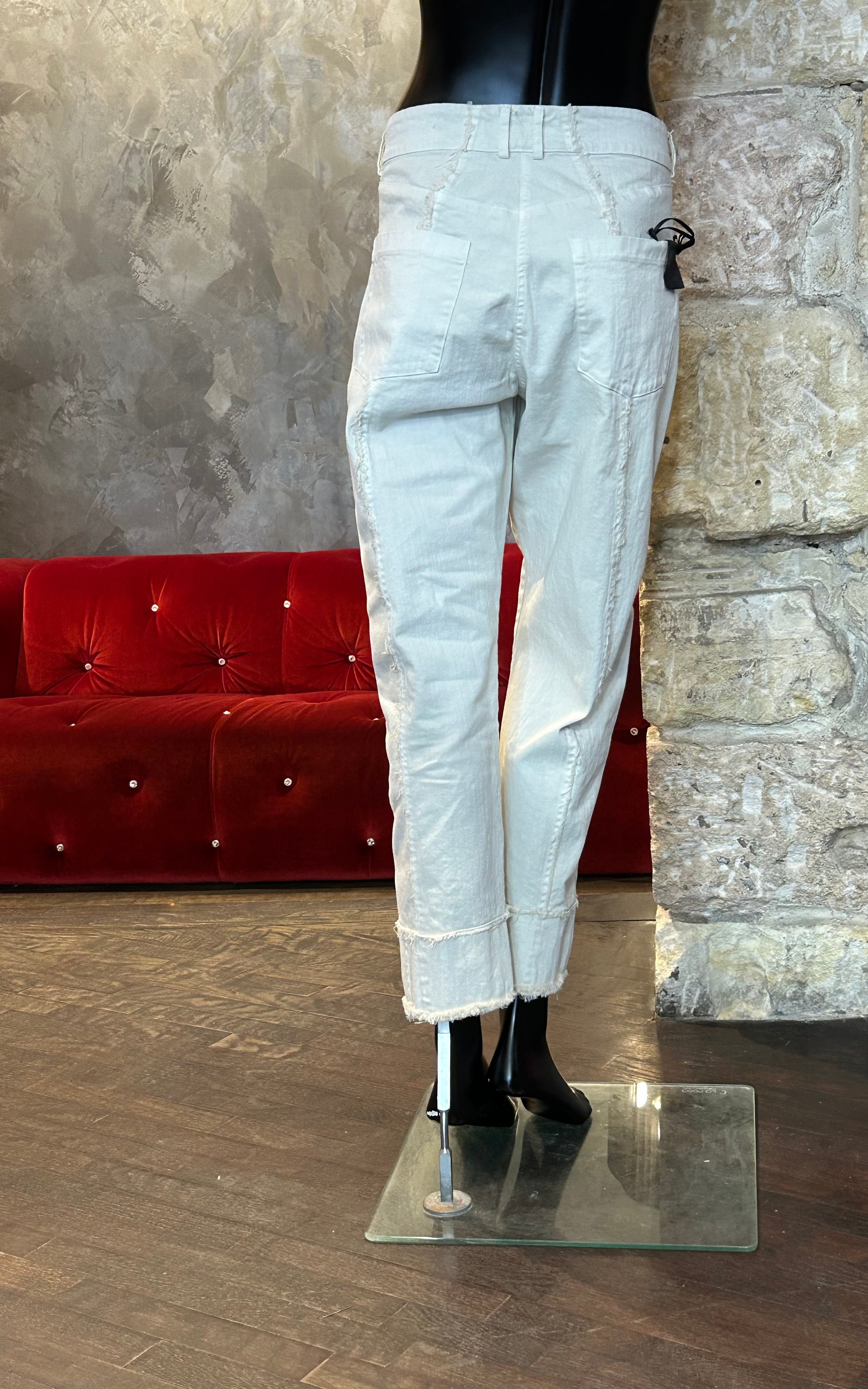 PANTALON ECRU DECOUPES FRANGEES