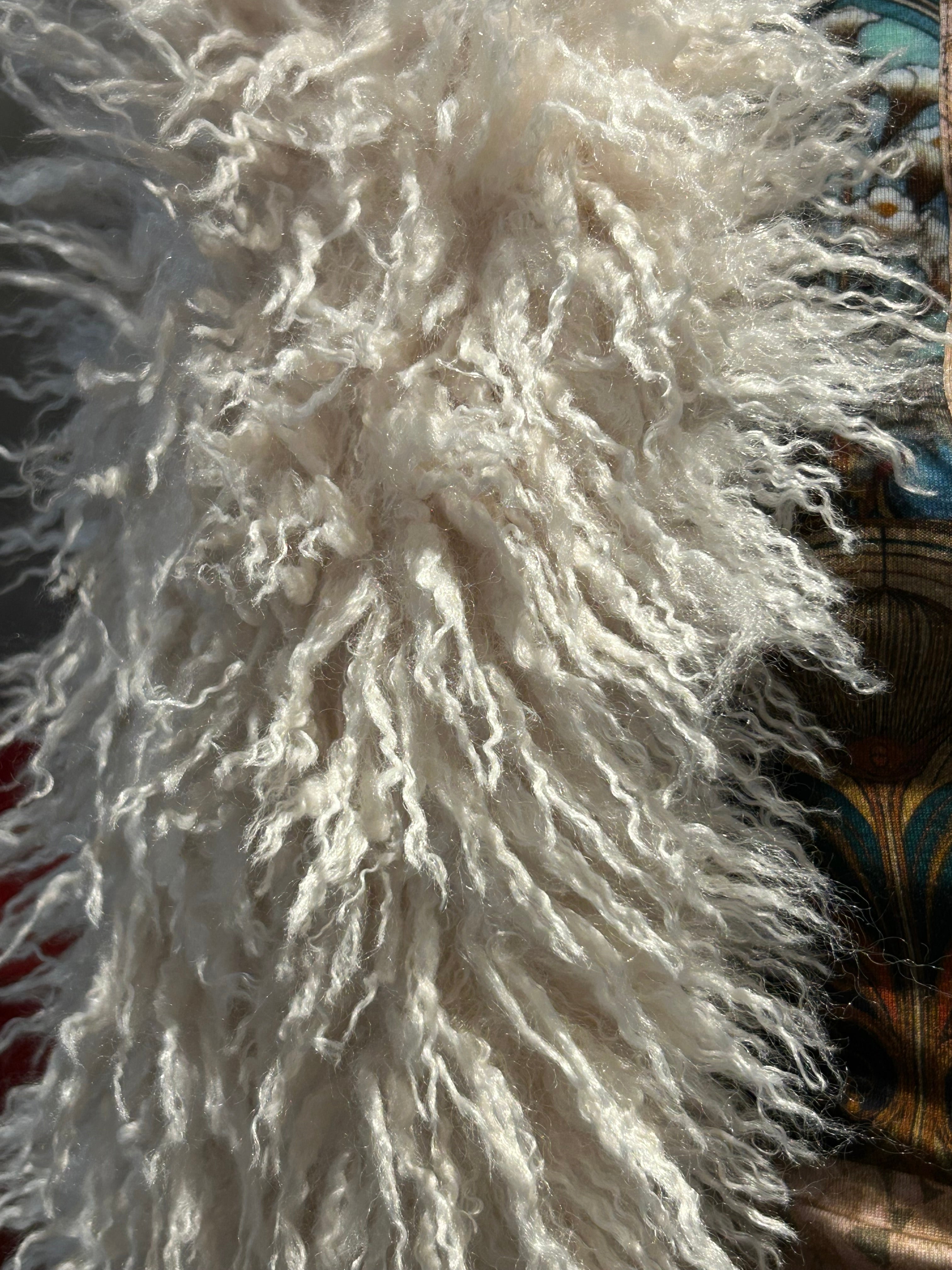 GILET FAUSSE FOURRURE AGNEAU DE MONGOLIE